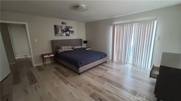 a kitchen with a stove and a refrigerator