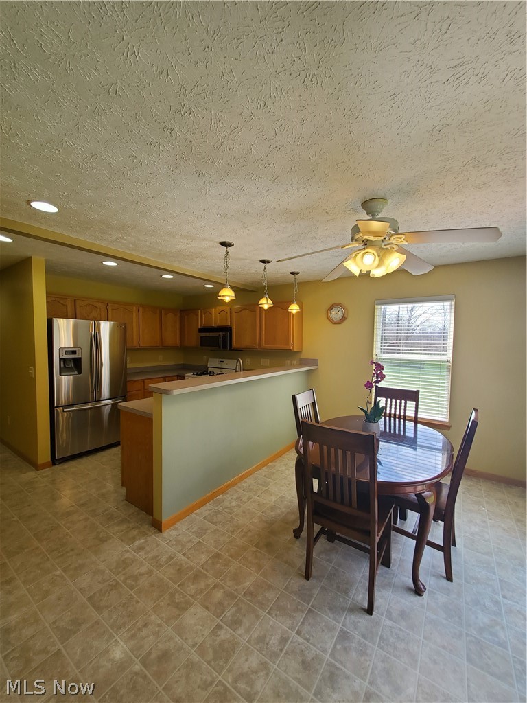 5520 Ridgeview Boulevard North Ridgeville, OH 44039 - Photo 9 of 35 Open style kitchen and dining area