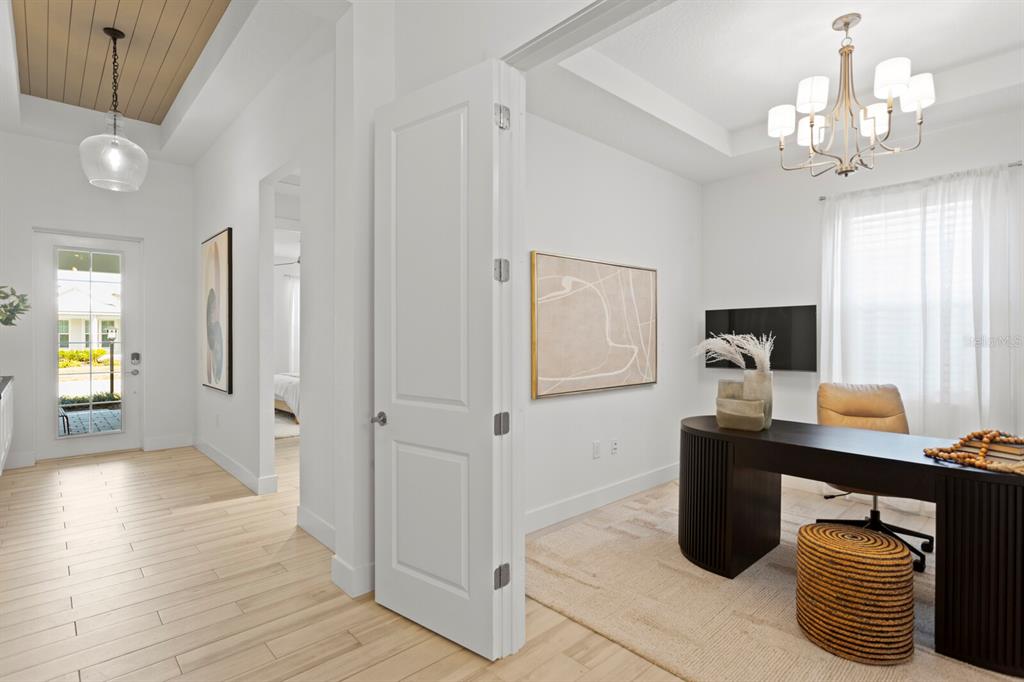 8057 Tidal Pointe Way Sarasota, FL 34240 - Photo 22 of 27 a view of a workspace with furniture and a window