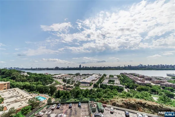 a bedroom with a bed and couch