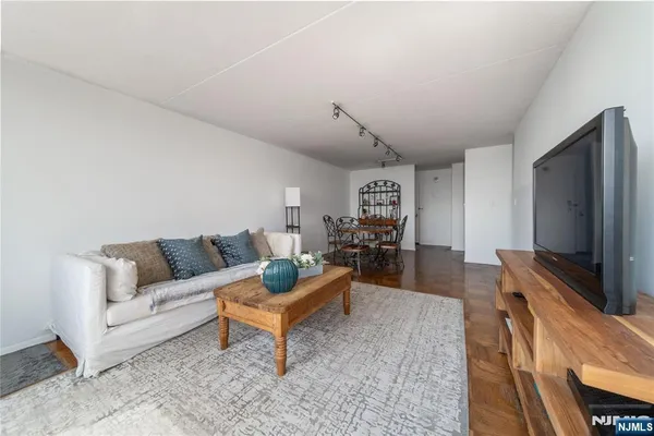 a kitchen with appliances a sink and lots of appliances