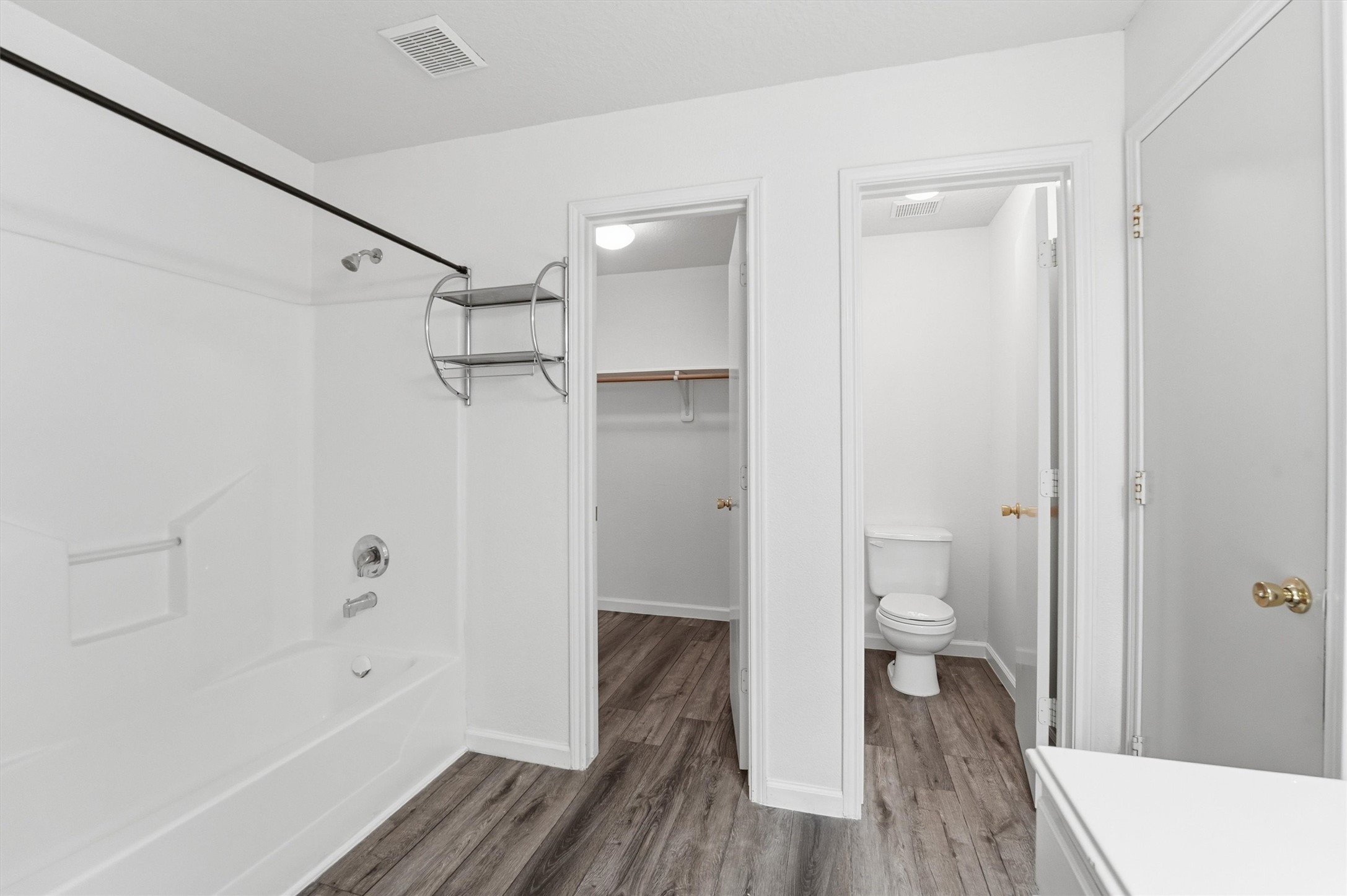 15403 Apple Bloom Way Channelview, TX 77530 - Photo 20 of 25 a bathroom view of a toilet and a shower