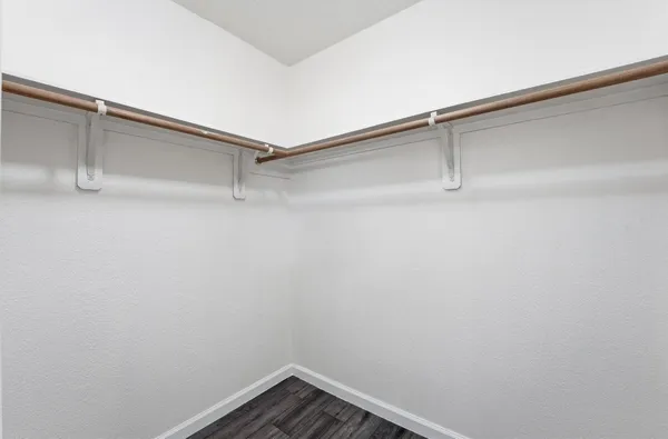a view of a room with shelf on the wall