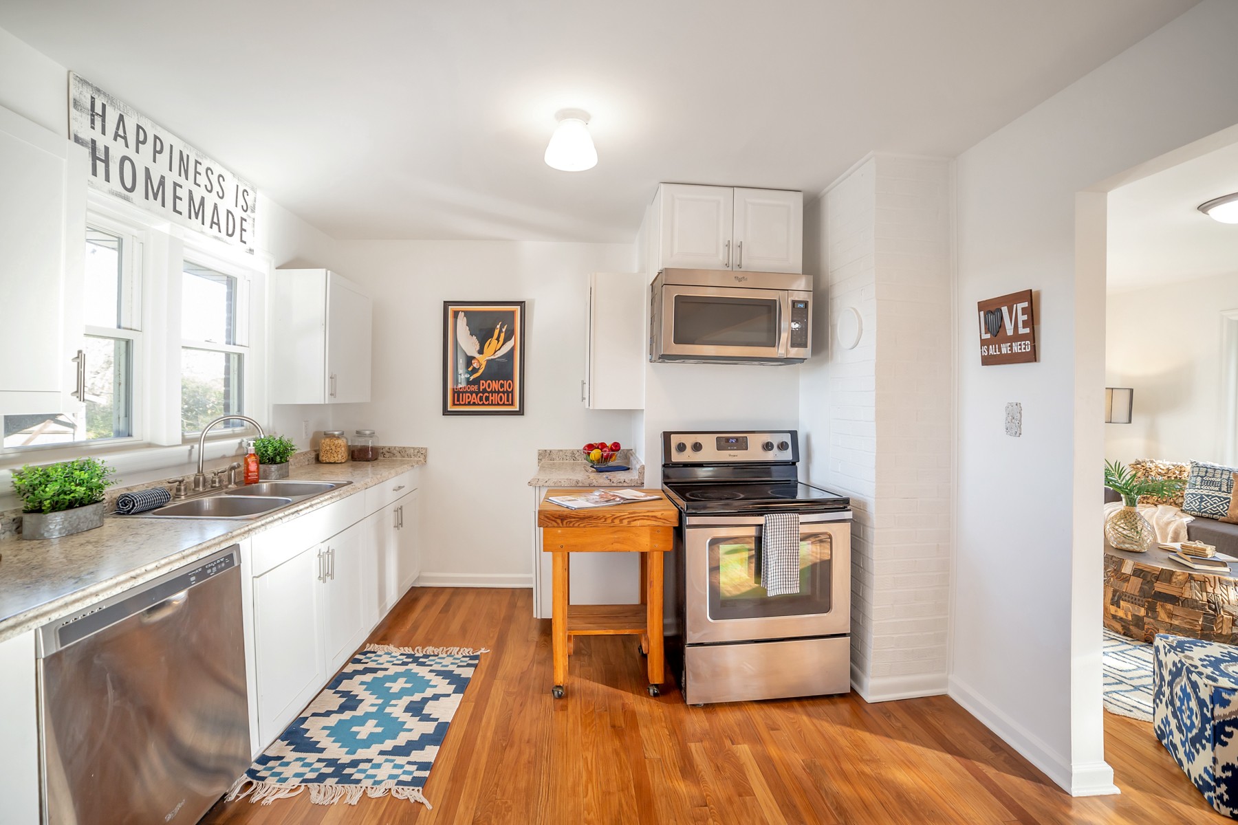 5774 Bending Chestnut Road Franklin, TN 37064 - Photo 1 of 17 a kitchen with stainless steel appliances a stove a sink and a refrigerator