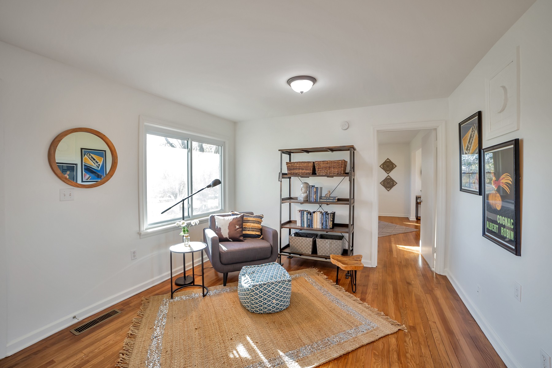 5774 Bending Chestnut Road Franklin, TN 37064 - Photo 7 of 17 a room with furniture and a wooden floor