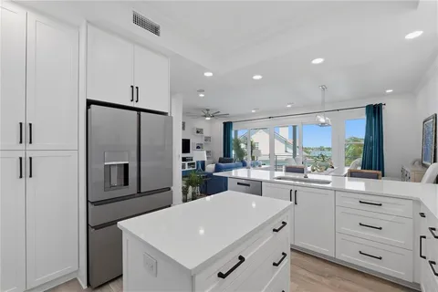 a spacious bedroom with a bed and a walk in closet