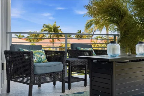 a bathroom with a double vanity sink a mirror and a shower