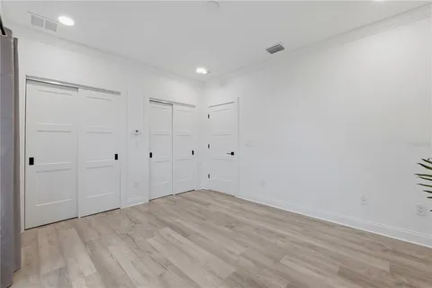 an aerial view of a house with a lake view