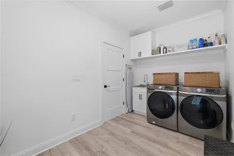 an aerial view of a city with lake view