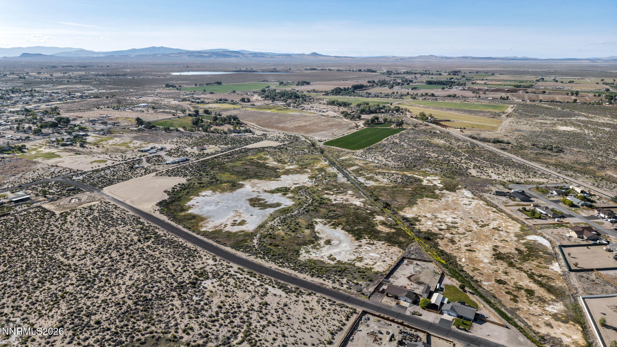 4568 Cardinal Drive Fallon, NV 89406 - Photo 9 of 12 an aerial view of residential houses with outdoor space