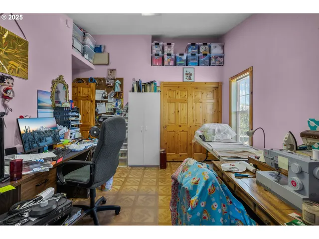 a room with furniture and gym equipment