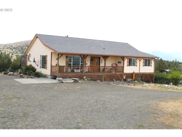 a view of a house with a street