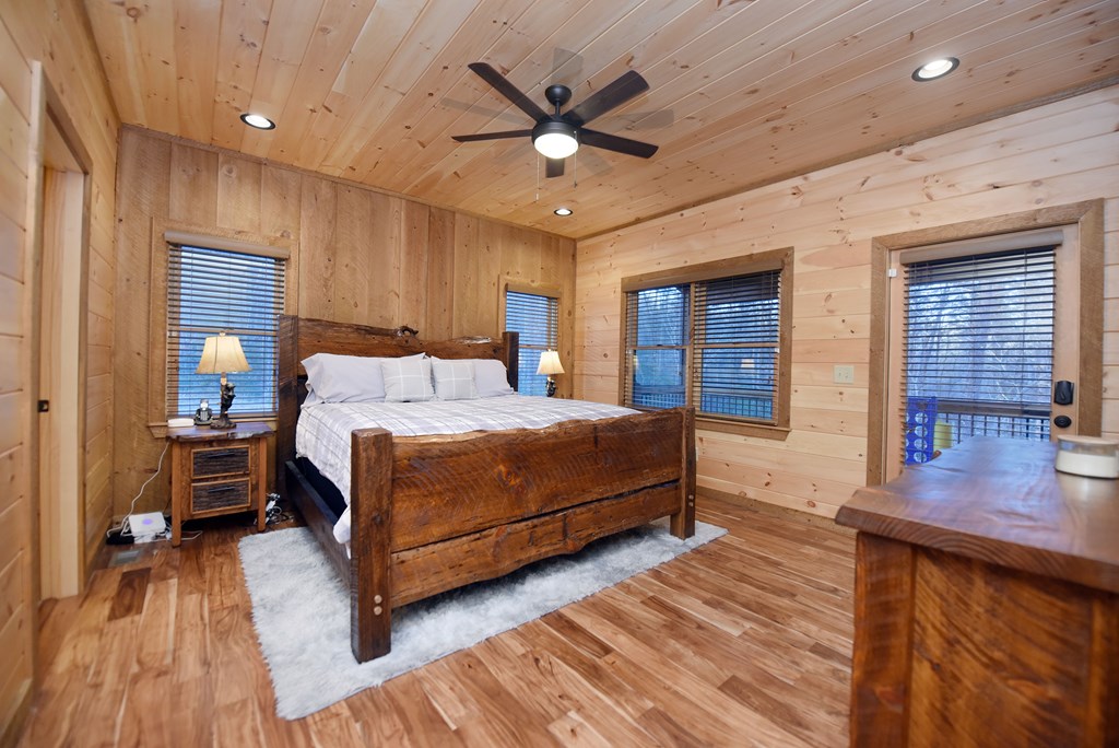 306 Native Trail Cherry Log, GA 30522 - Photo 39 of 65 a bedroom with a bed and window