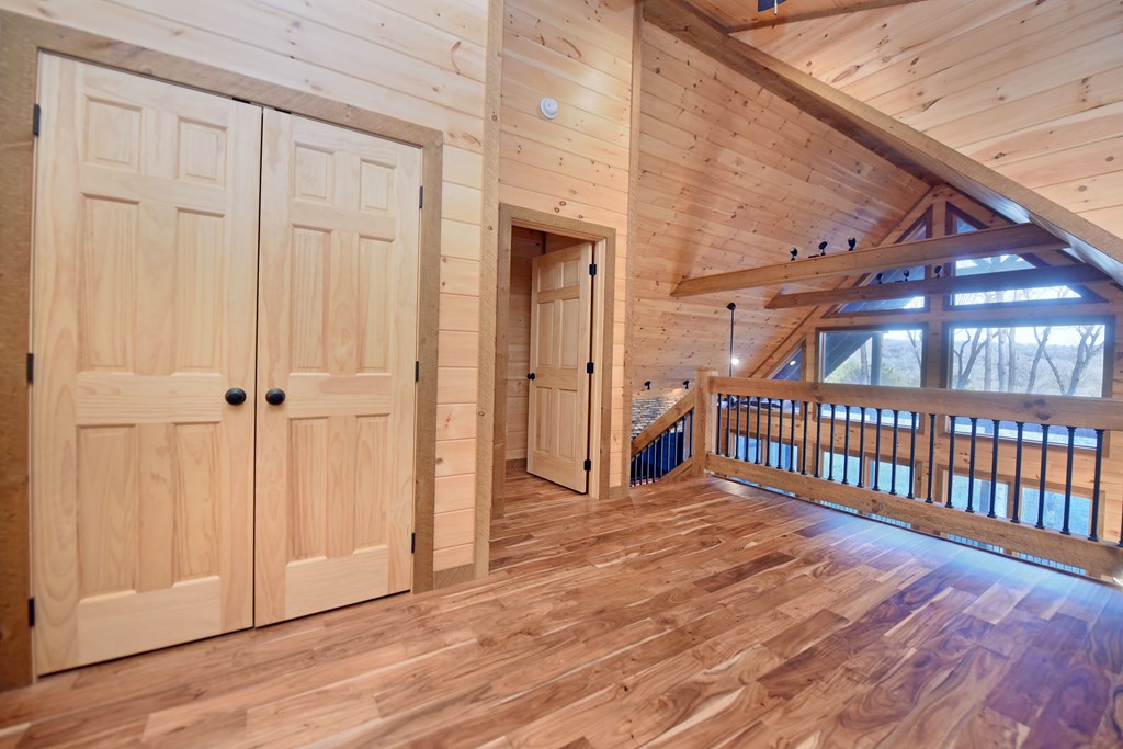 306 Native Trail Cherry Log, GA 30522 - Photo 45 of 65 a view of a hallway with wooden floor and entryway