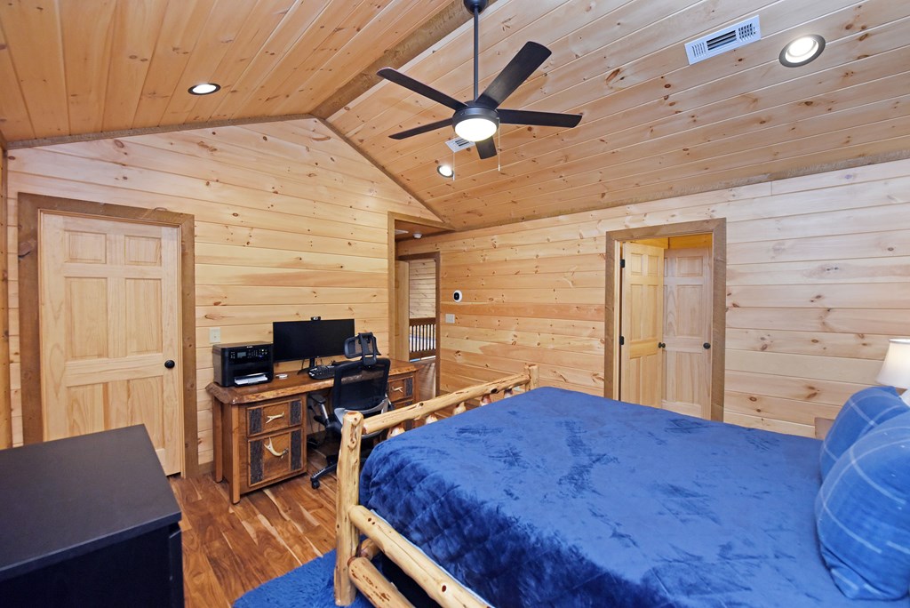 306 Native Trail Cherry Log, GA 30522 - Photo 47 of 65 a bedroom with a bed and a desk