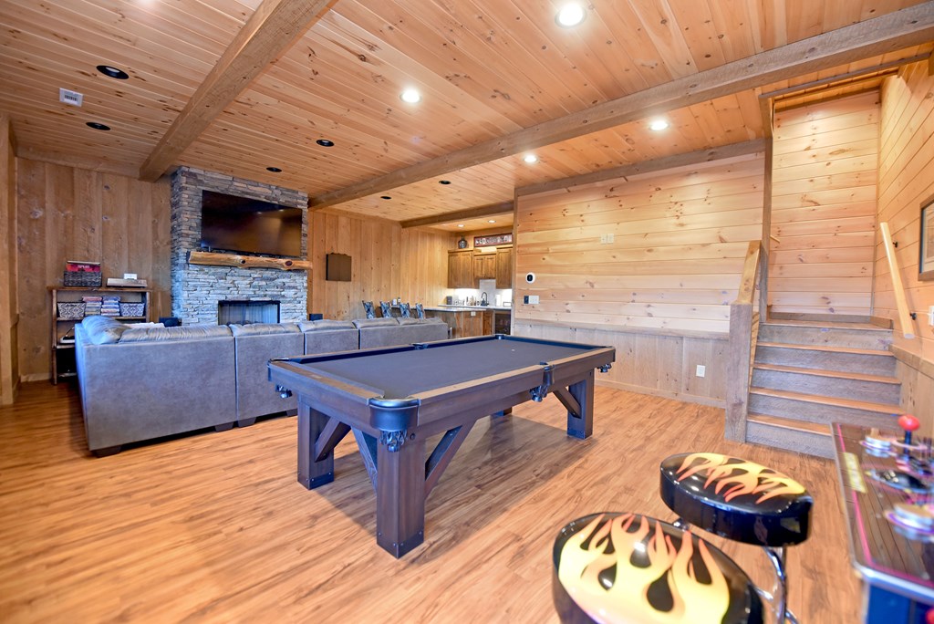 306 Native Trail Cherry Log, GA 30522 - Photo 52 of 65 a living room with furniture a flat screen tv and kitchen view