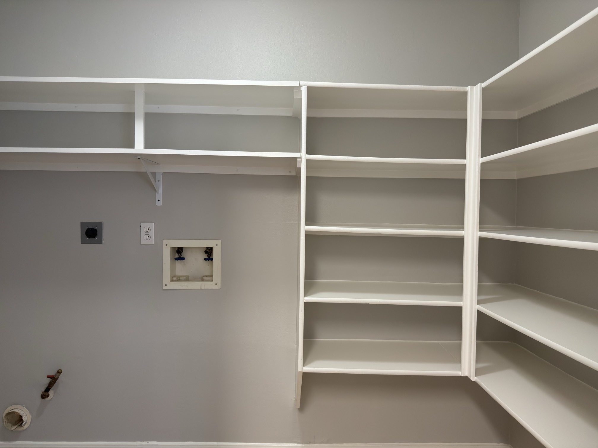 14431 Andrea Way Lane Houston, TX 77083 - Photo 8 of 20 a view of walk in closet with empty racks