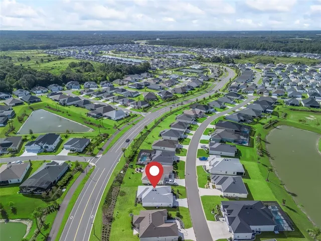 an aerial view of a house with a garden