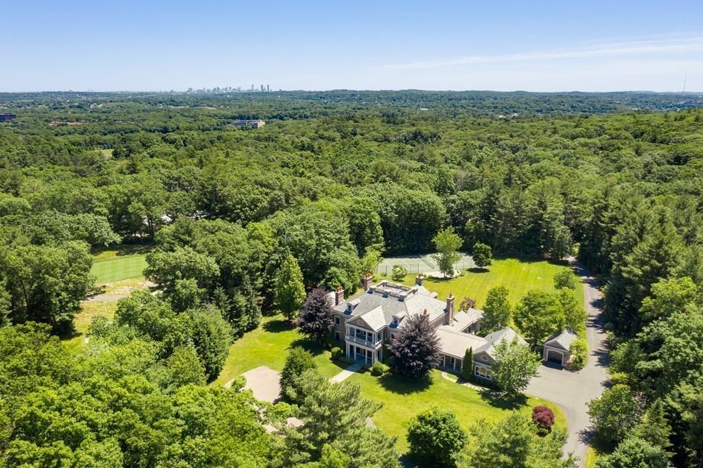 63 Cart Path Road Weston, MA 02493 - Photo 3 of 37 a view of a bunch of houses with yard