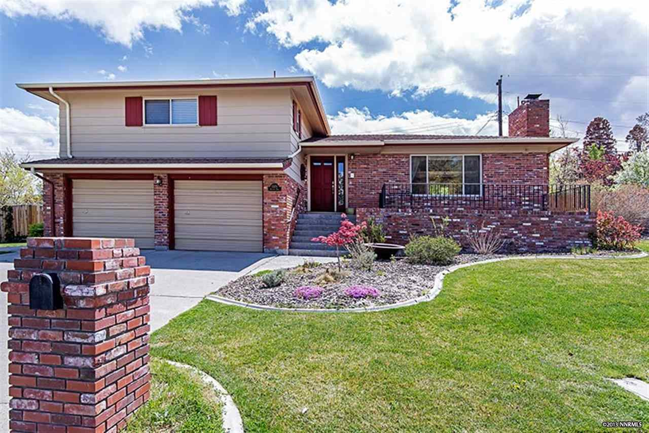 3370 Belford Road Reno, NV 89509 - Photo 1 of 1 a front view of a house with a garden