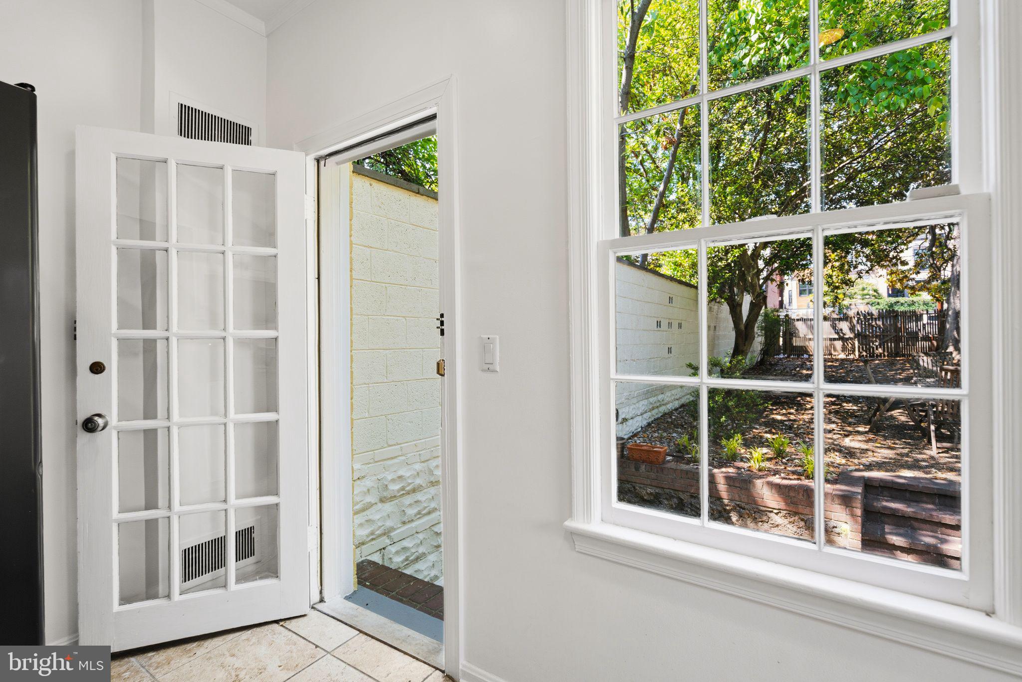 3315 Dent Place Northwest Washington, DC 20007 - Photo 16 of 41 Kitchen door to patio/courtyard