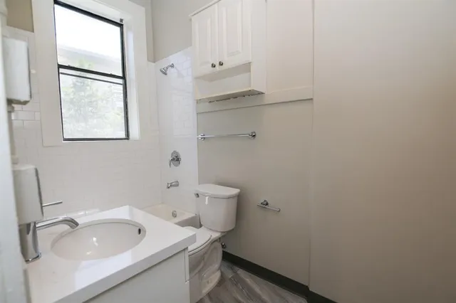 a bathroom with a sink and a toilet