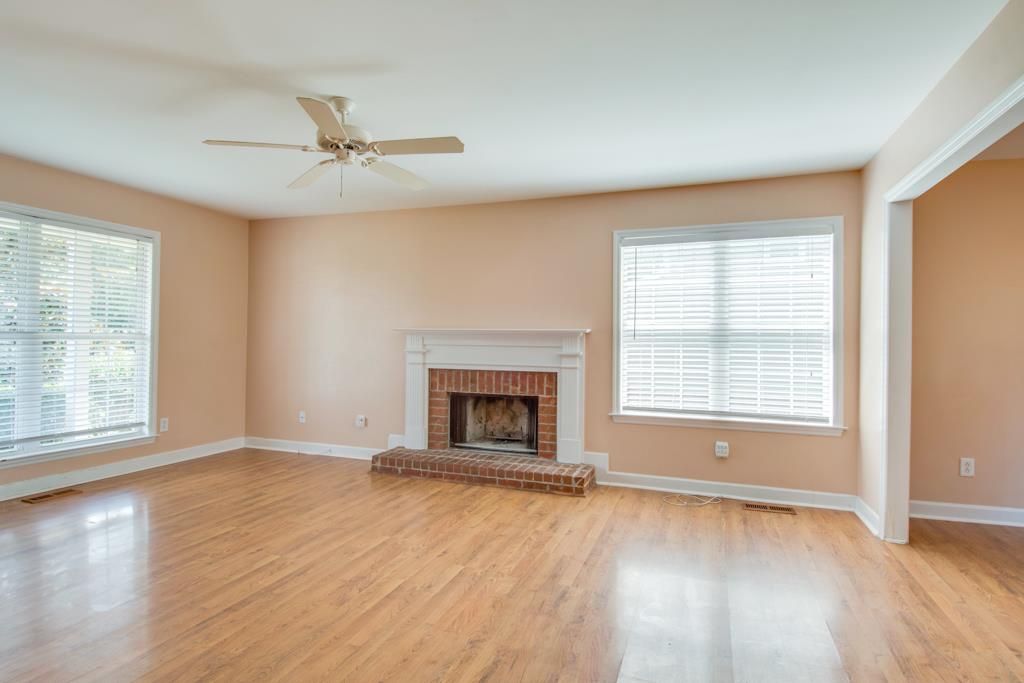 1818 O'Reilly Circle Spring Hill, TN 37174 - Photo 1 of 19 Beautiful living room with so much natural light and a fireplace.