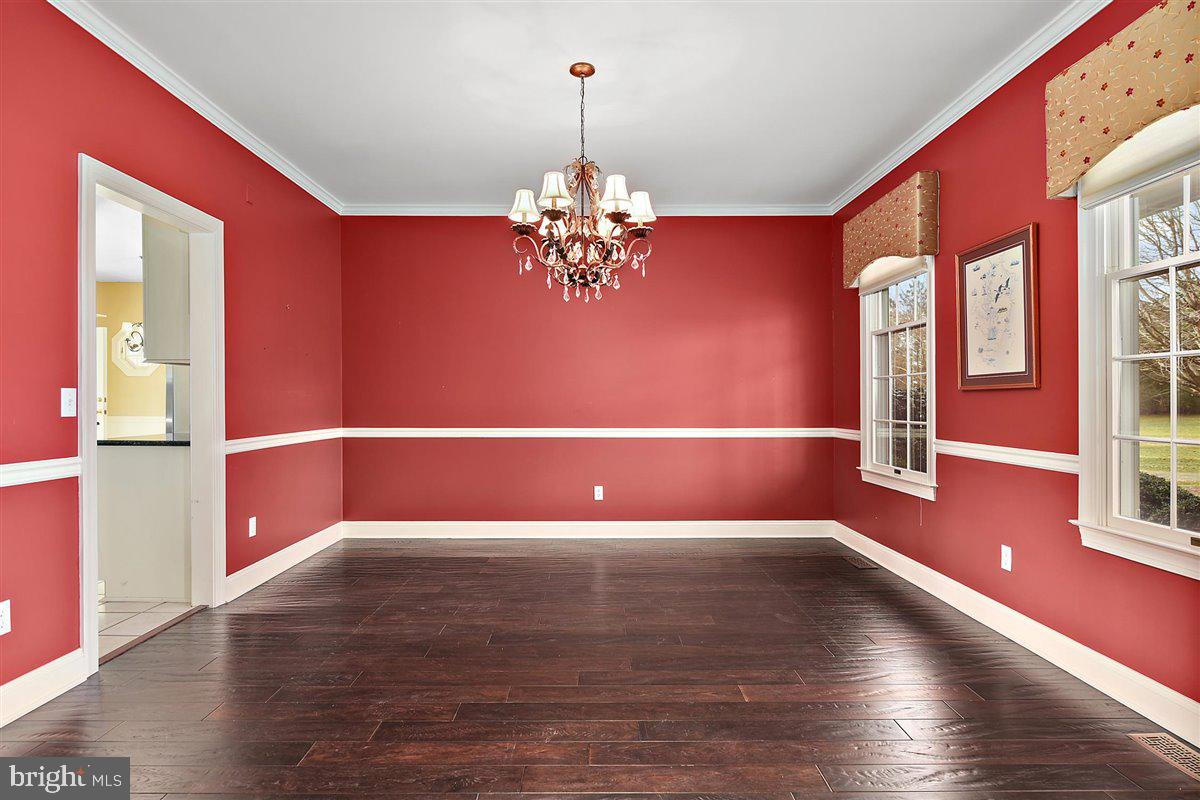 3357 Redden Ferry Road Eden, MD 21822 - Photo 13 of 107 Crown Molding, Chair Rail and Hardwoods