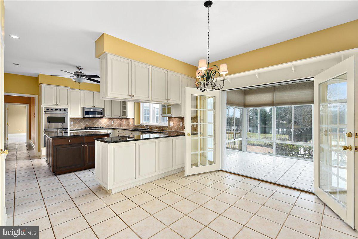 3357 Redden Ferry Road Eden, MD 21822 - Photo 27 of 107 Casual Dining Area w/ Sun Room Access