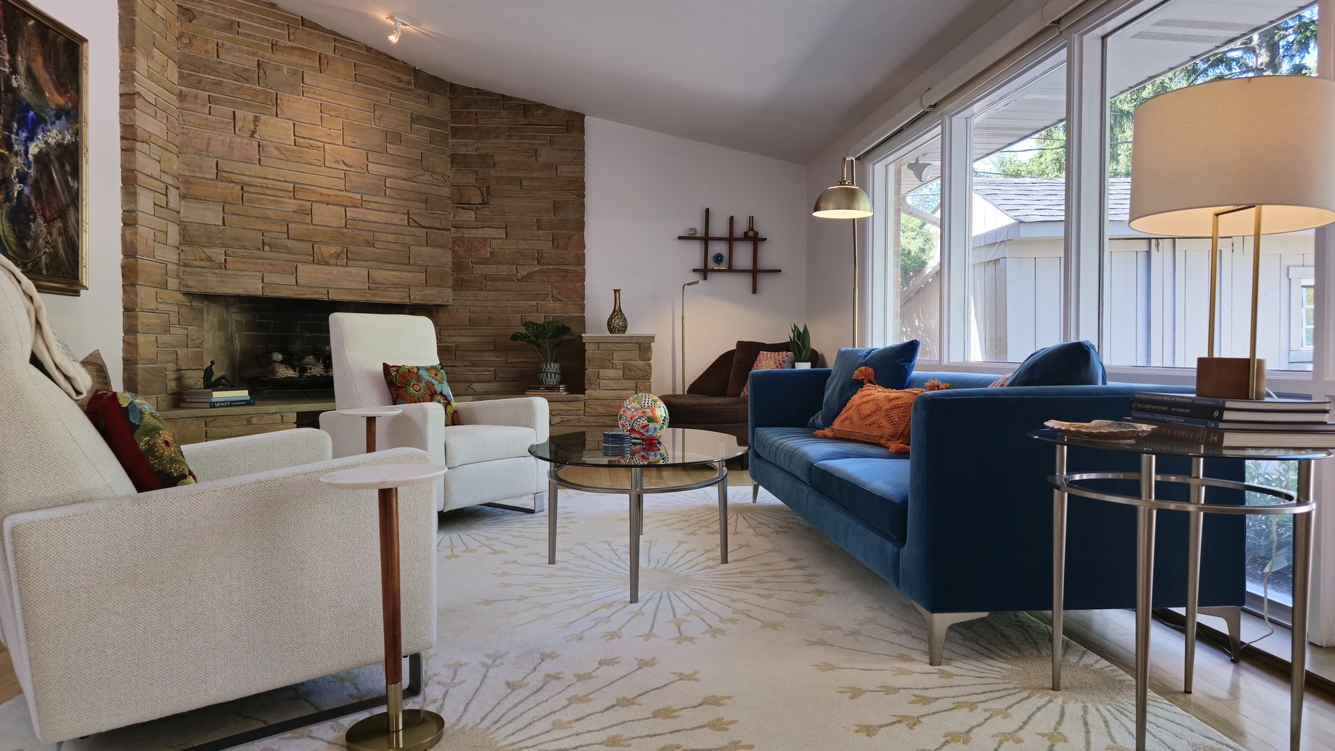 906 Lenox Road Glenview, IL 60025 - Photo 2 of 6 a living room with fireplace furniture and a floor to ceiling window