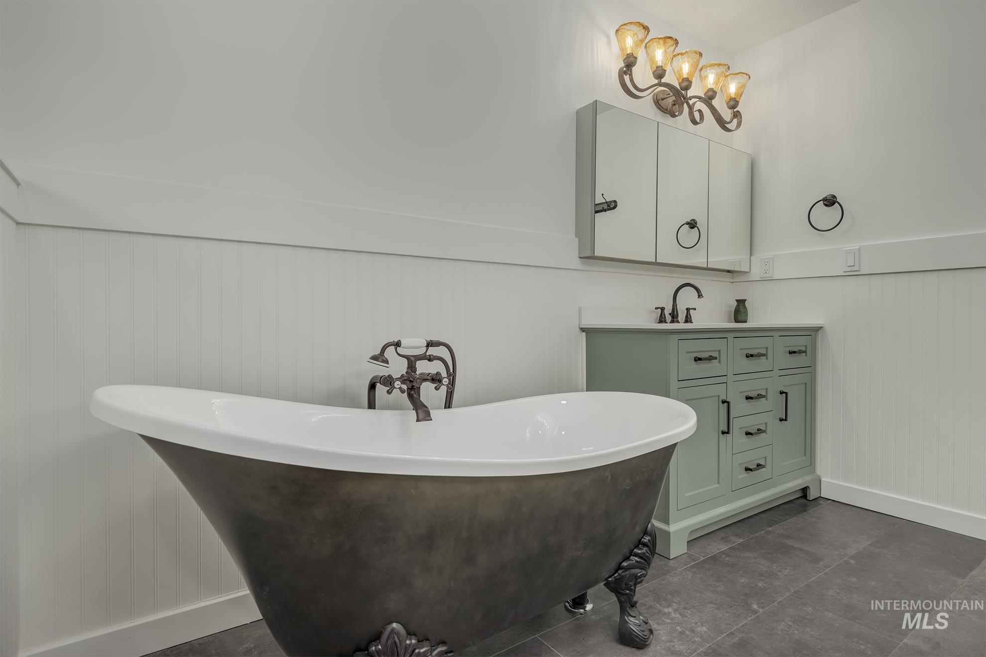 748 Pringle Road Weiser, ID 83672 - Photo 18 of 47 Freestanding soaking tub with ornate feet and exposed plumbing