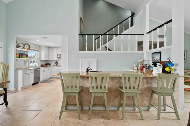 a view of a workspace with furniture