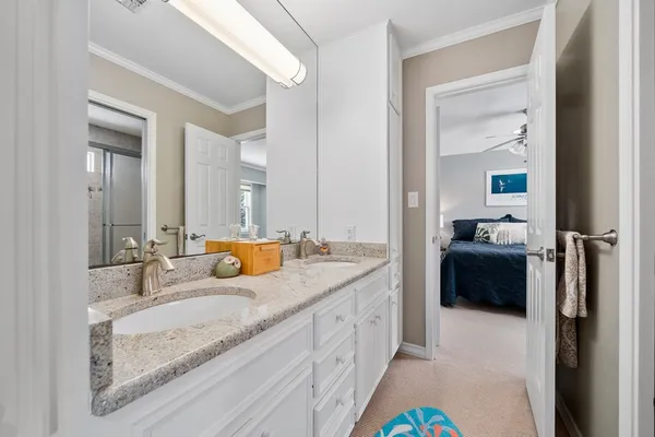 a bathroom with a shower a toilet and a shower