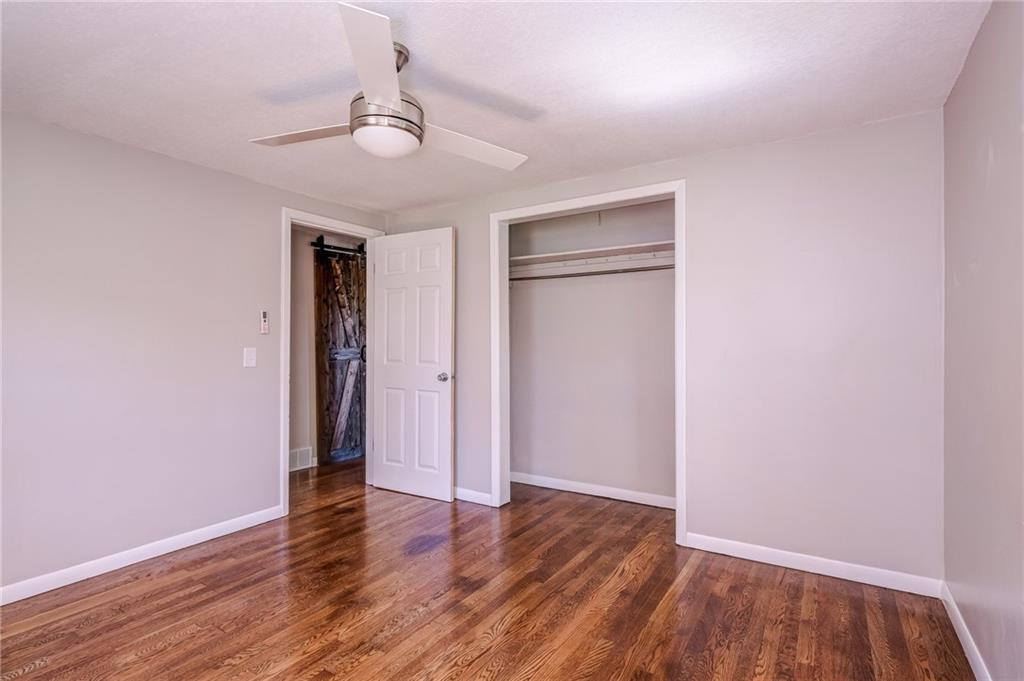 954 Old Princeton Road New Castle, PA 16101 - Photo 8 of 24 a view of an empty room with wooden floor