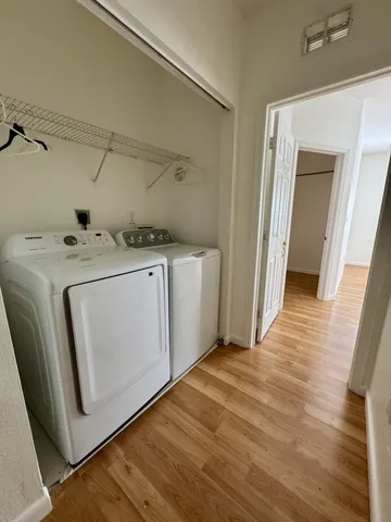 a utility room with dryer and washer