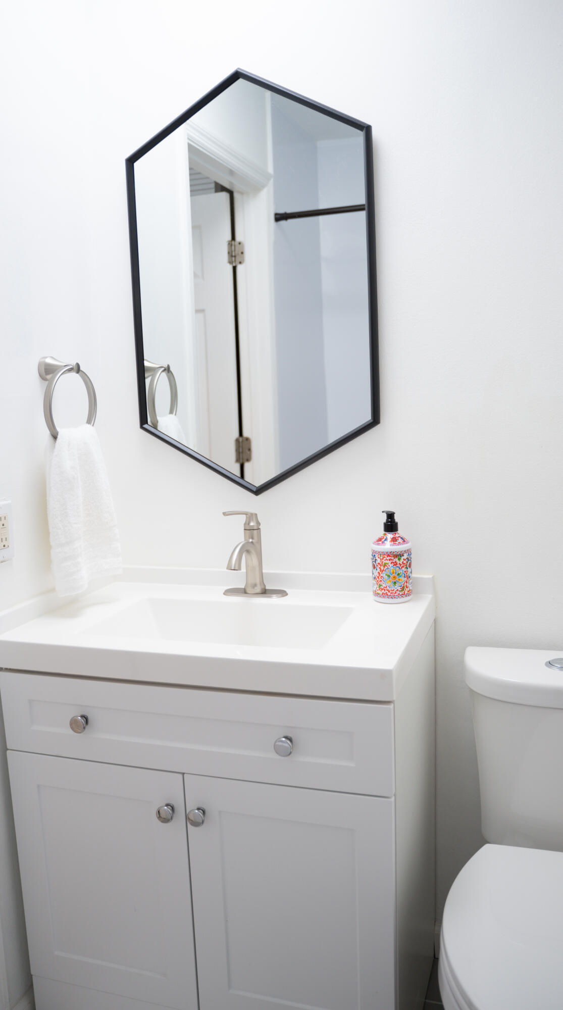 1425 Riverside Circle Wellington, FL 33414 - Photo 21 of 35 a bathroom with a toilet sink and mirror