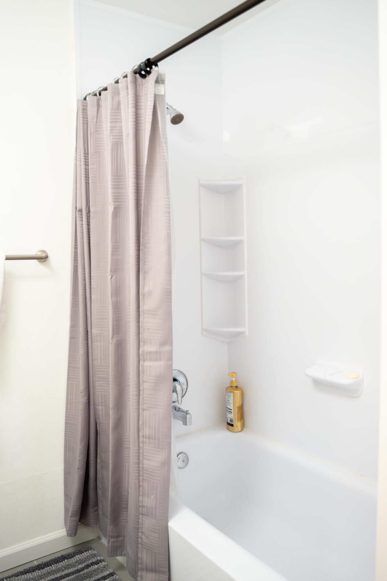 1425 Riverside Circle Wellington, FL 33414 - Photo 23 of 35 a bathroom with a shower and a tub
