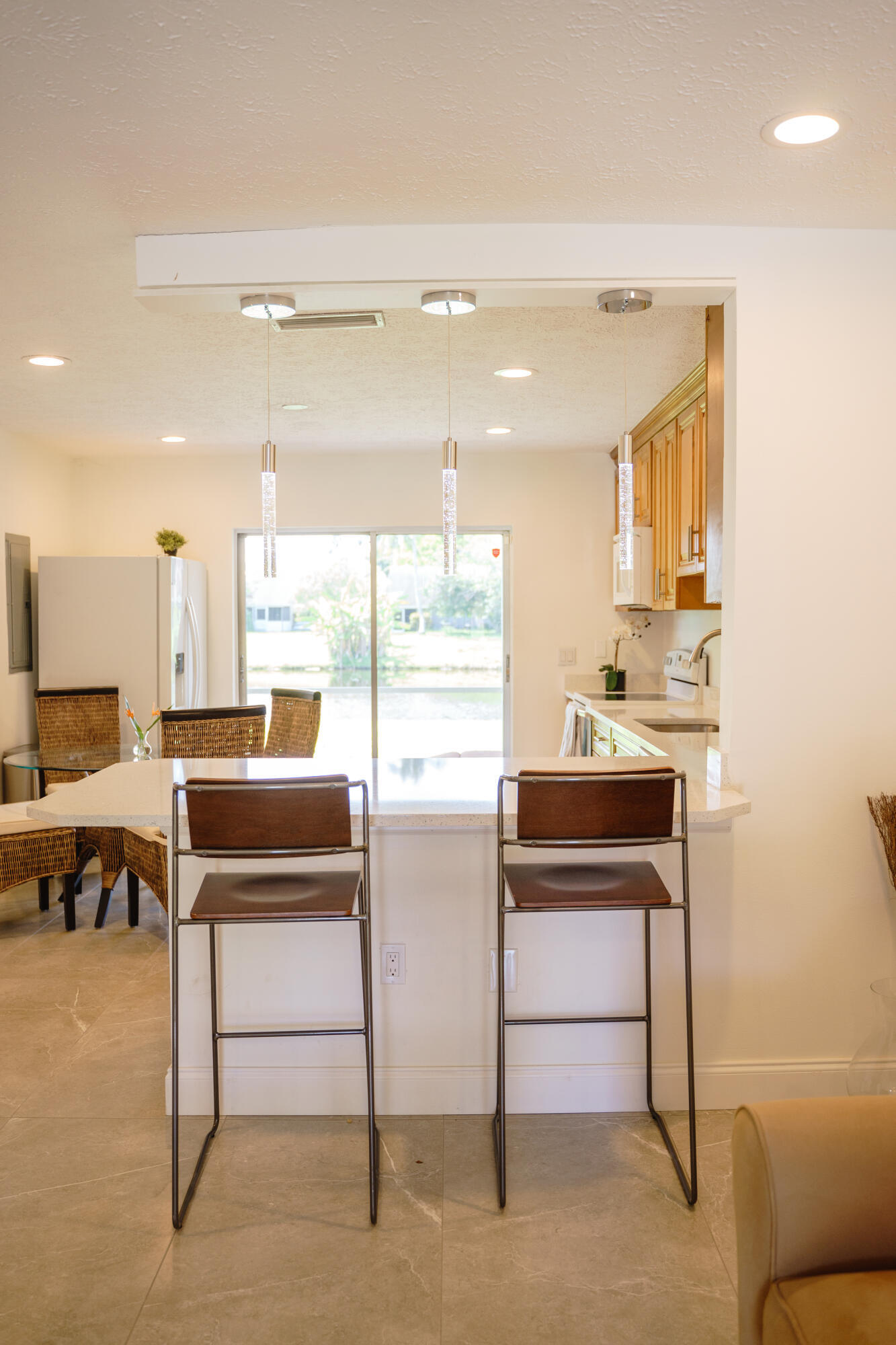 1425 Riverside Circle Wellington, FL 33414 - Photo 35 of 35 a kitchen with a sink furniture and a window