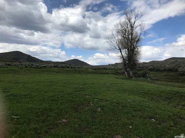 60 Corral Road, Unit 60 Kamas, UT 84036 - Photo 1 of 11 View of mountain backdrop featuring rural landscape