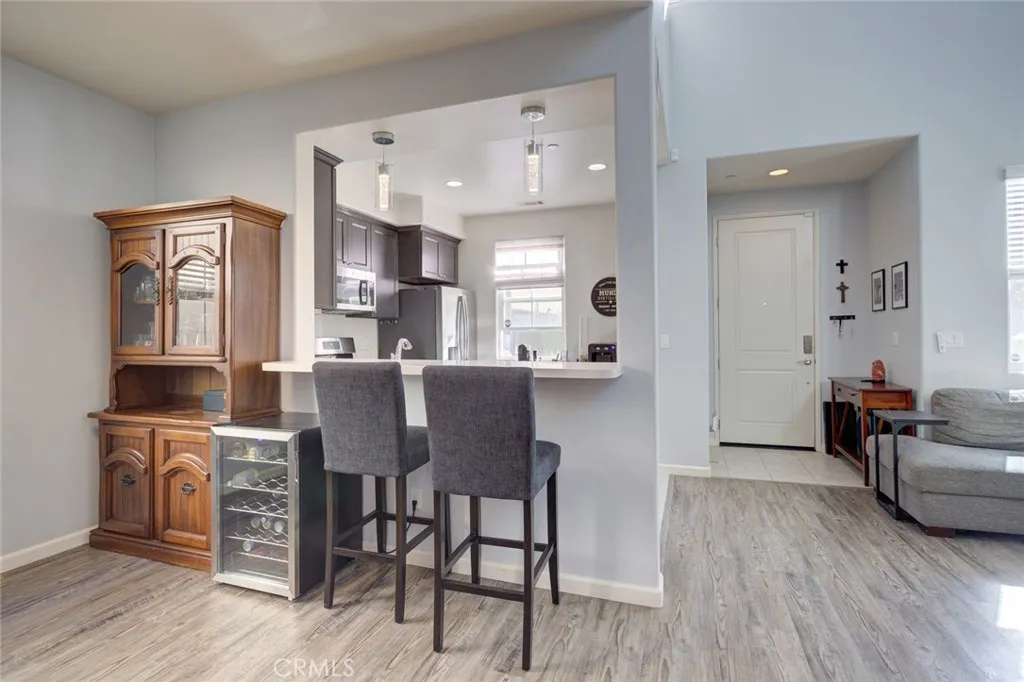 1913 Celebration Avenue Santa Maria, CA 93454 - Photo 11 of 35 a view of kitchen with cabinets and wooden floor