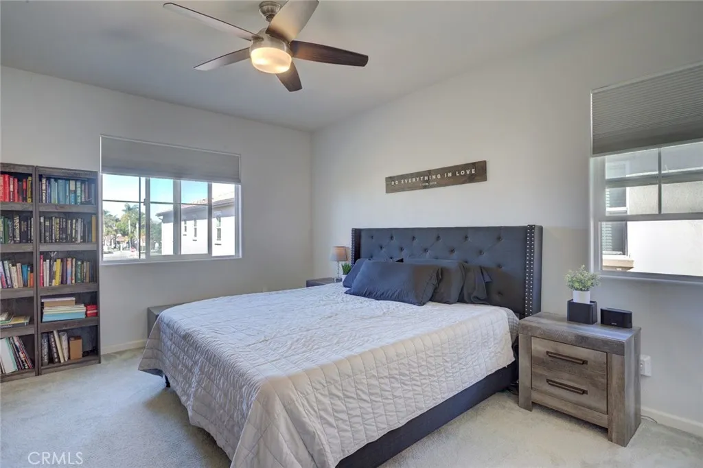 1913 Celebration Avenue Santa Maria, CA 93454 - Photo 26 of 35 a bedroom with a bed furniture and a window