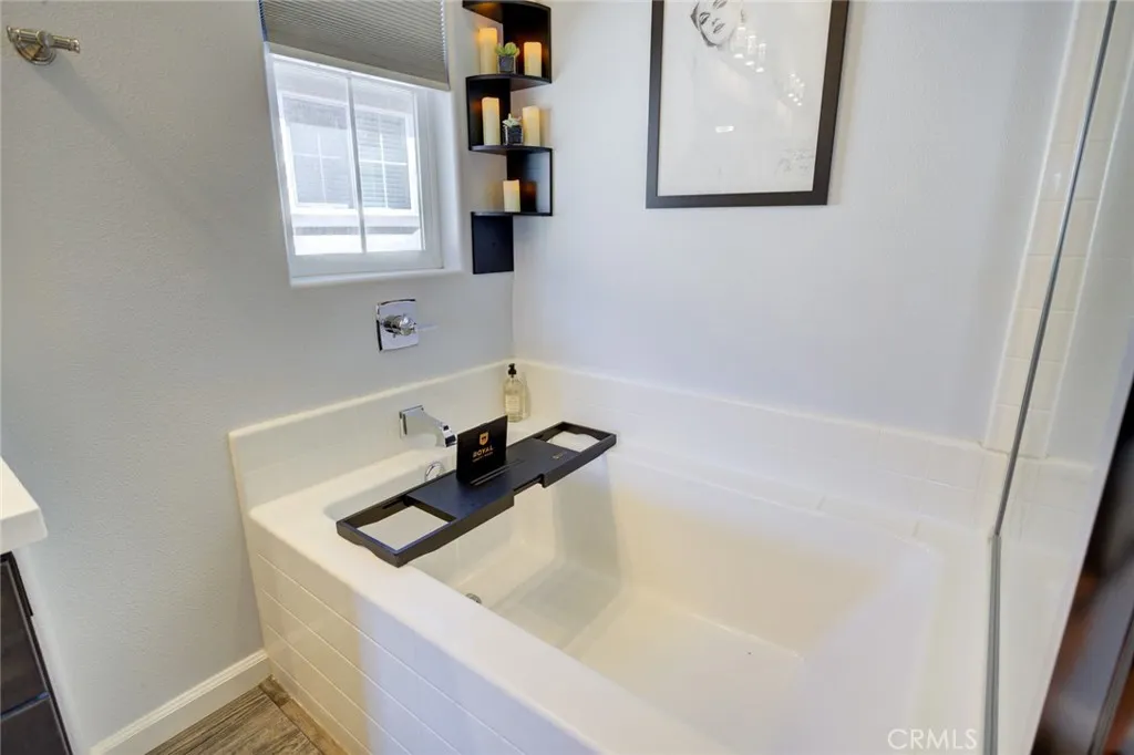 1913 Celebration Avenue Santa Maria, CA 93454 - Photo 32 of 35 a bathroom with a bathtub