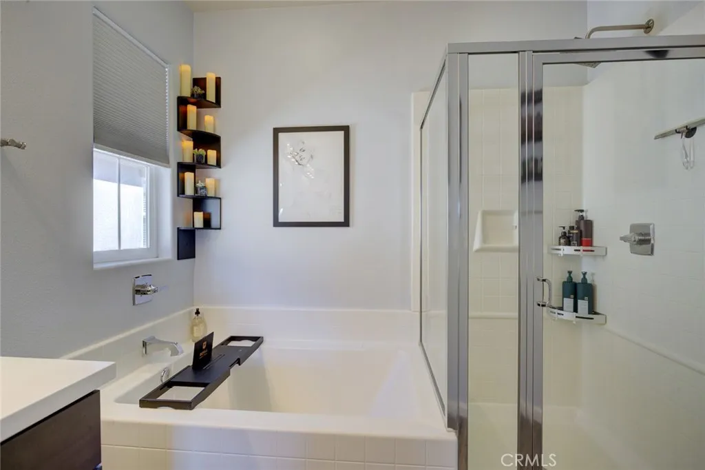 1913 Celebration Avenue Santa Maria, CA 93454 - Photo 33 of 35 a bathroom with a tub and a shower