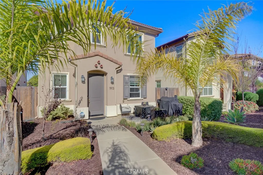1913 Celebration Avenue Santa Maria, CA 93454 - Photo 5 of 35 a front view of a house with a yard