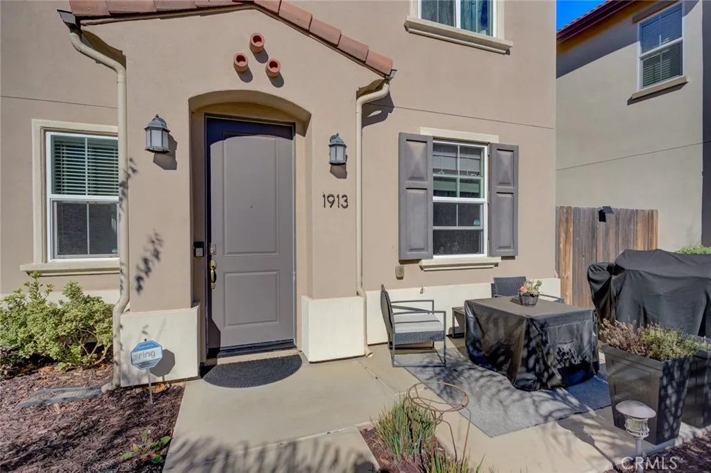 1913 Celebration Avenue Santa Maria, CA 93454 - Photo 6 of 35 a balcony with furniture and potted plants