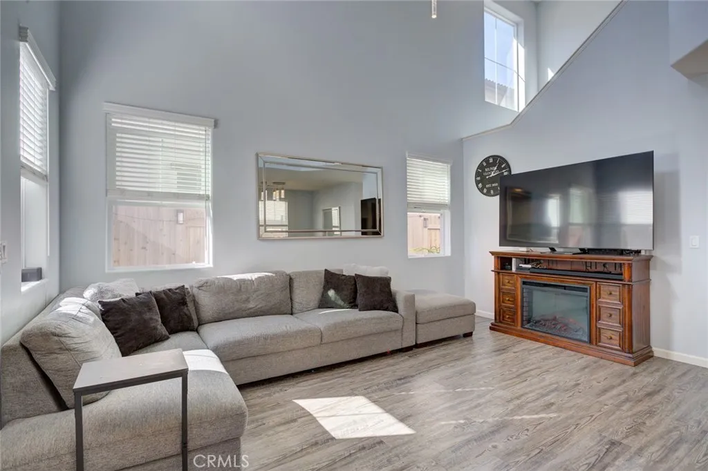 1913 Celebration Avenue Santa Maria, CA 93454 - Photo 8 of 35 a living room with furniture and a flat screen tv