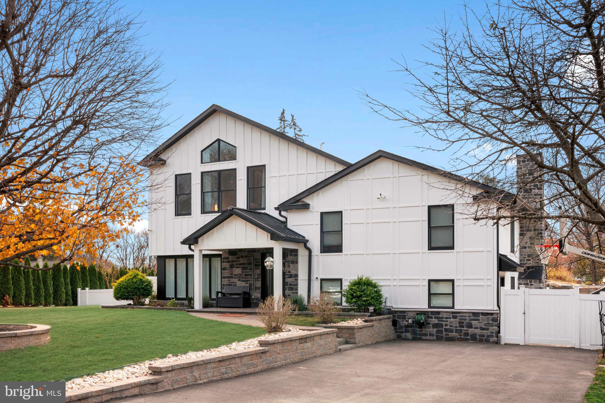a view of a yard in front view of a house