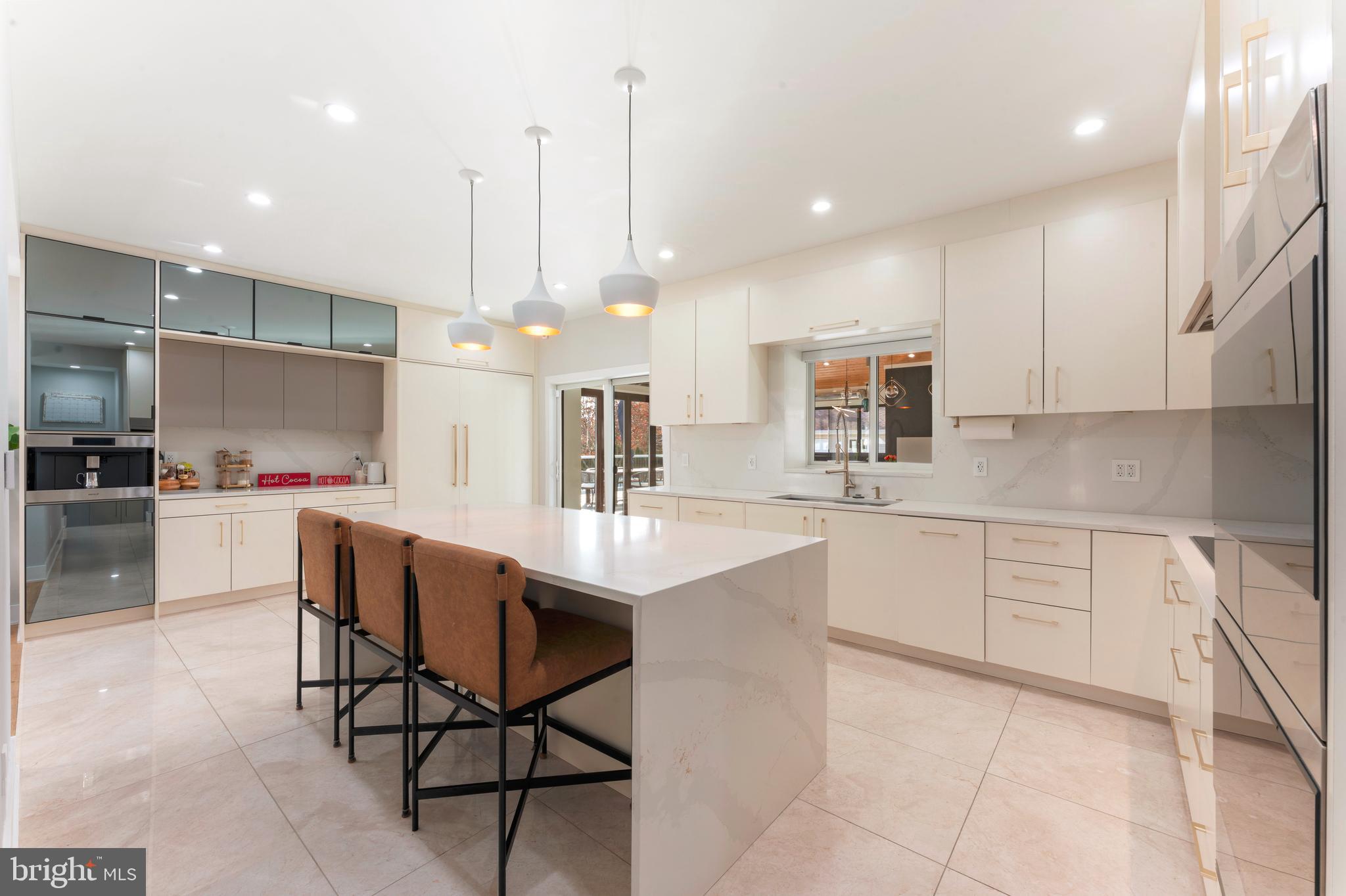 528 Hoyt Road Huntingdon Valley, PA 19006 - Photo 13 of 56 a kitchen with stainless steel appliances kitchen island granite countertop a sink and cabinets