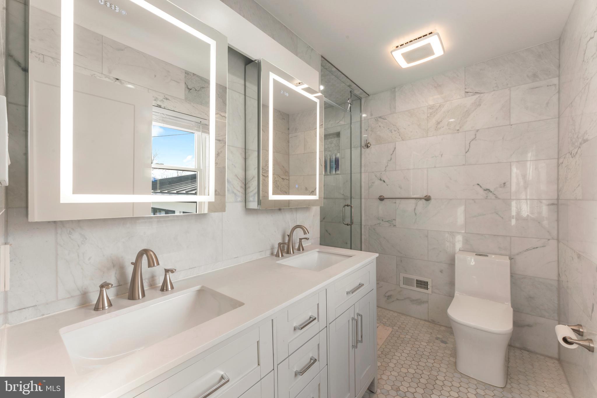 528 Hoyt Road Huntingdon Valley, PA 19006 - Photo 35 of 56 a bathroom with a double vanity sink toilet and shower