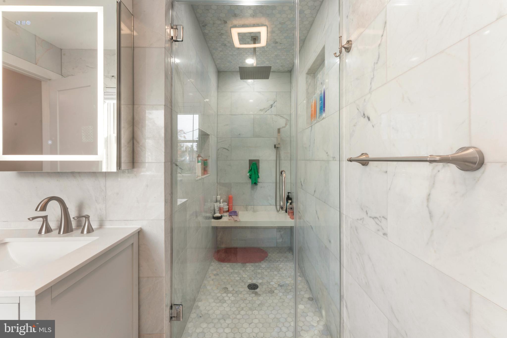 528 Hoyt Road Huntingdon Valley, PA 19006 - Photo 36 of 56 a bathroom with a sink shower and a mirror